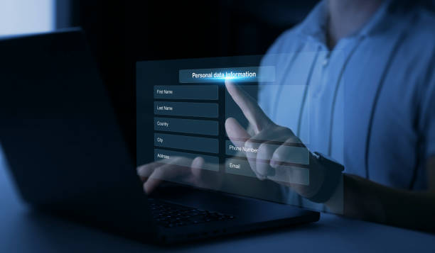 istock Personal data information management.Digital online employee form. Human resource concept.Businessman filling out a form with personal data online. 2200433278