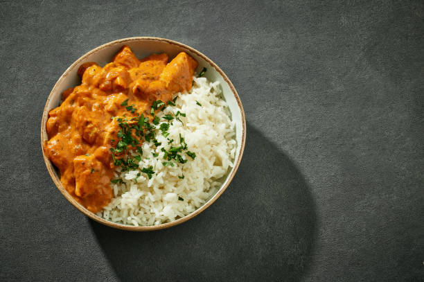 istock bowl of Chicken Tikka Masala with Rice 2200435148