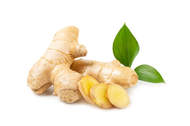 istock Fresh ginger and lemon isolated on white background. Sliced ​​ginger. Ginger root. Traditional alternative medicine, healing tea for immunity. Close-up. 2200435168