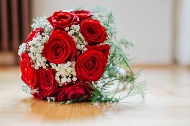 Happy marriage. Bear doll and beautiful wedding bouquet