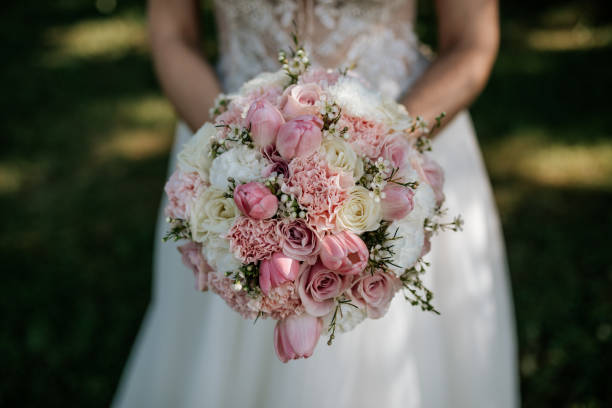 istock Bride Holding Elegant Wedding Bouquet 2200437915