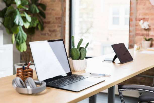 istock Modern Workplace with Laptop, Tablet, and Headphones 2200446150