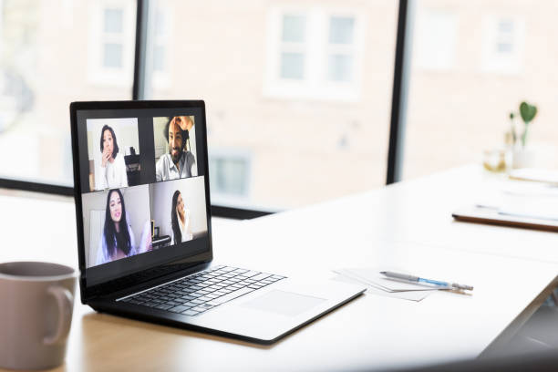 istock Video Conference Meeting: Diverse Team Collaboration on Laptop 2200446170