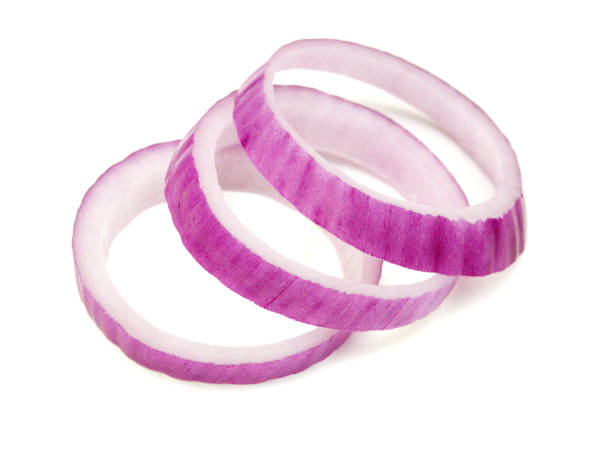 istock Red onion rings on white background 2200446216