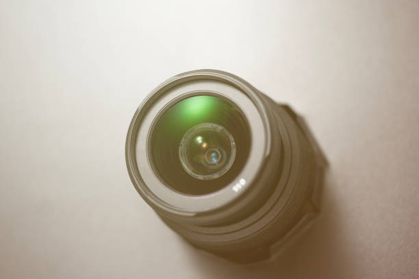 istock A camera lens with a green circle in the center 2200448392