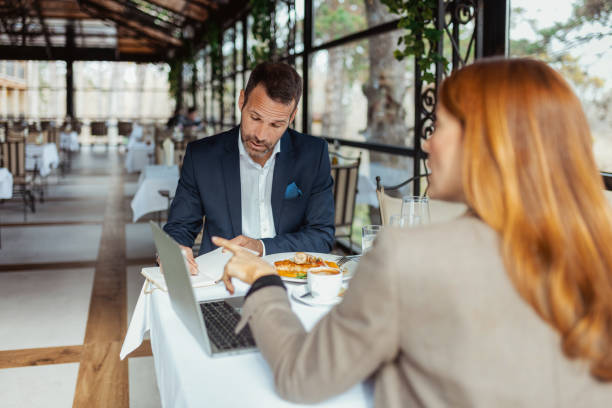 istock Business Lunch Meeting – Work and Dining Combined 2200452945