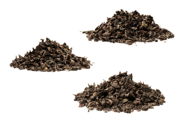 istock Dried tea leaves isolated on a white background. 2200454359