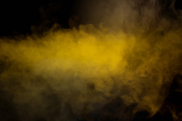 istock Yellow steam on a black background. 2200454386