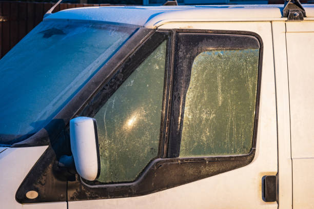 istock Frost snow covered van door handle and window in england uk 2200455056