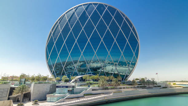 Circular skyscraper Aldar Headquarters Building timelapse hyperlapse in Abu Dhabi, UAE.