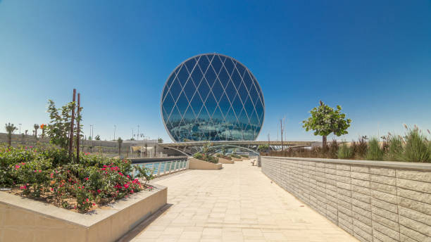 istock Circular skyscraper Aldar Headquarters Building timelapse hyperlapse in Abu Dhabi, UAE. 2200465707