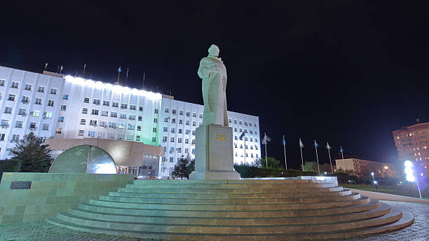 Sultan Beibars Monument Night Timelapse Hyperlapse in Atyrau City, Kazakhstan. Witness the Illuminated Tribute Under the Night Sky in Celebration of Historical Grandeur.