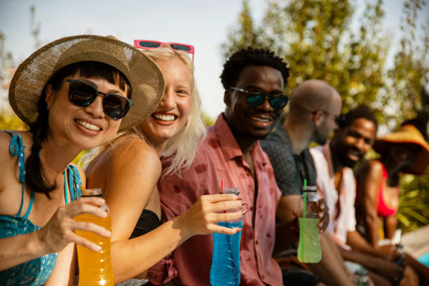 istock Party friends with drinks outdoor on Summer day 2200472649