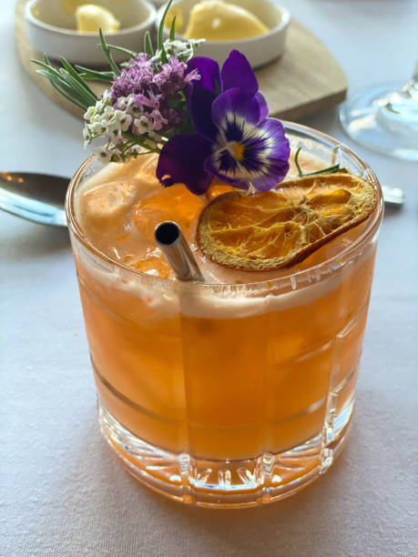 istock Elegant Floral Cocktail with Dried Citrus Garnish 2200474461