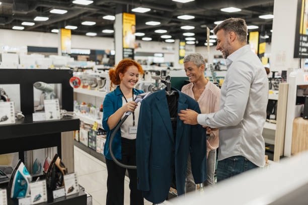 istock Enthusiastic demonstration in an appliance store 2200477604