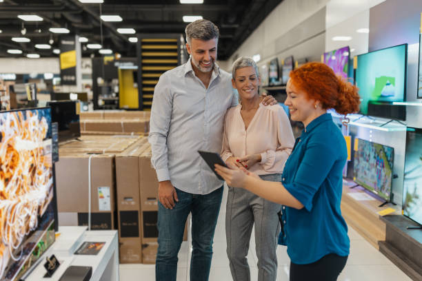 istock Couple Shopping for Electronics in Store 2200477773