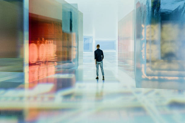 istock Casual young man walking in futuristic VR environment 2200480933