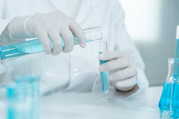 istock Scientist analyze biochemical samples in advanced scientific laboratory. Medical professional use dropper mix microbiological developmental of viral. Biotechnology research in  science lab. cosmetic 2200481118