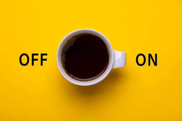 istock Creative Morning Coffee Cup with Energy Wake Up On Button 2200482390