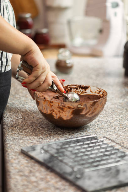 istock A Woman Preparing Chocolate Truffles 2200482444