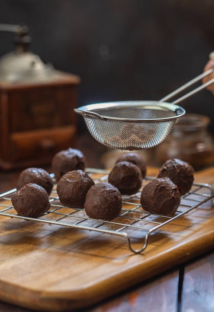 A Woman Preparing Chocolate Truffles