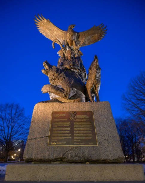 National Aboriginal Veterans Monument in Ottawa at dusk with deep blue night sky background
