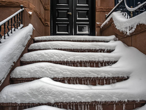 istock View of Upper East Side Manhattan, snow on steos 2200489860