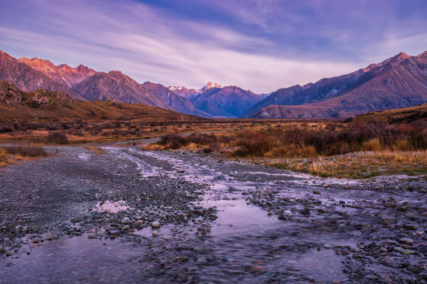 istock Arid alpine valley scene with snow covered Southern Alps Mountain Range 2200497276