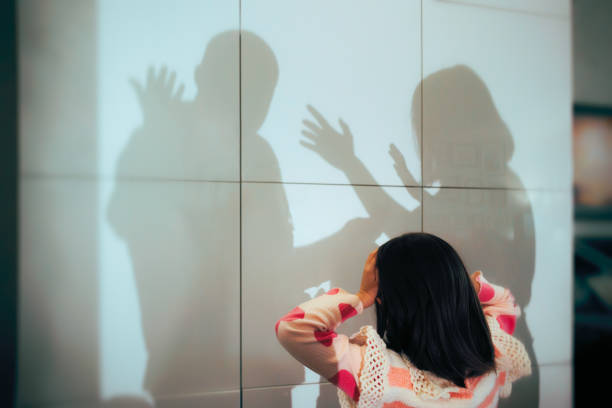 istock Child Exasperated by her Parents Fighting at Home 2200497647