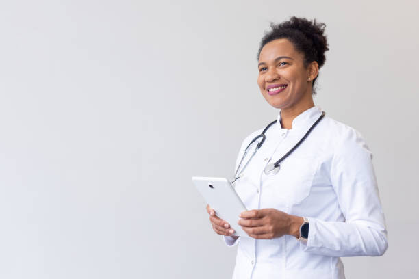 istock Determined African American doctor reviewing prescriptions on a tablet 2200498749