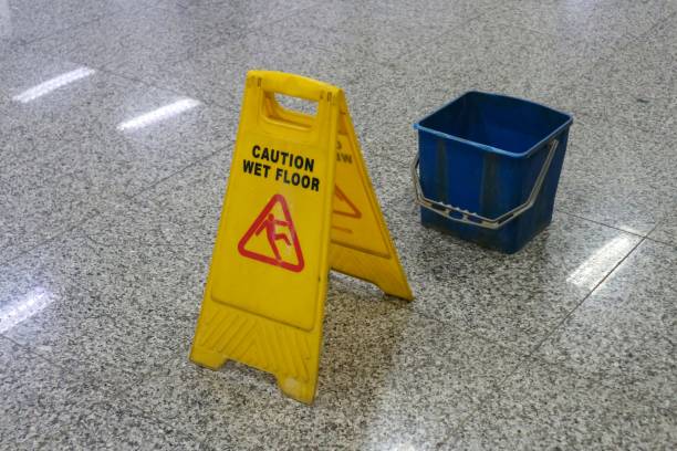 istock Yellow Caution wet floor sign at station 2200500481