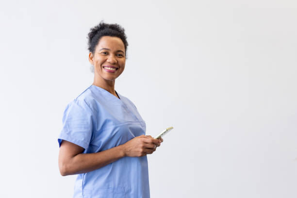 istock Professional nurse browsing medical information on a smartphone 2200501306