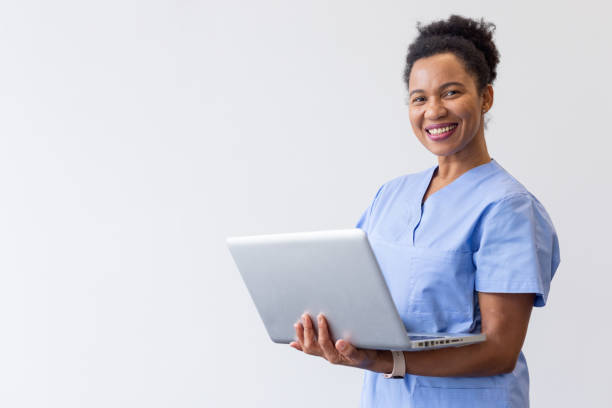 istock Smart nurse analyzing test results on a portable laptop 2200502495