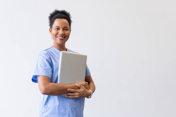 istock Experienced African American nurse with a warm smile 2200503302