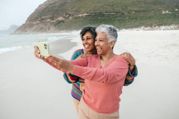 istock Healing through laughter and friendship by the ocean 2200505923