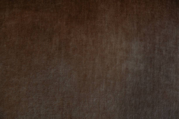 istock Subtle texture of dark brown fabric highlighting its soft appearance and quality 2200506562