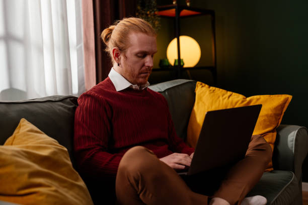 istock Focused Man Working on Laptop at Home 2200506693