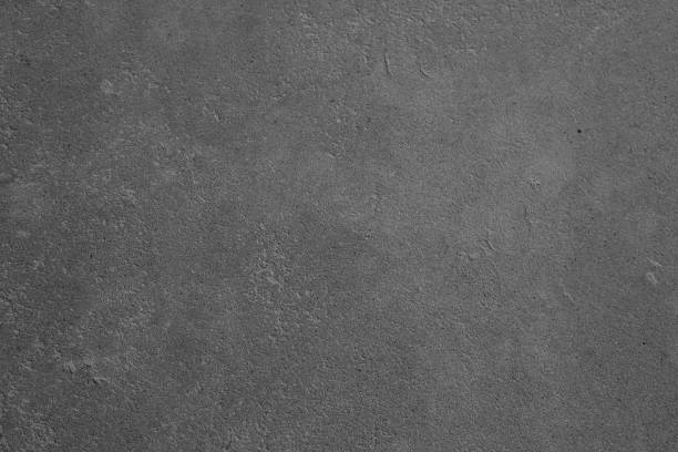 istock Textured gray concrete surface with subtle imperfections and variations 2200506727