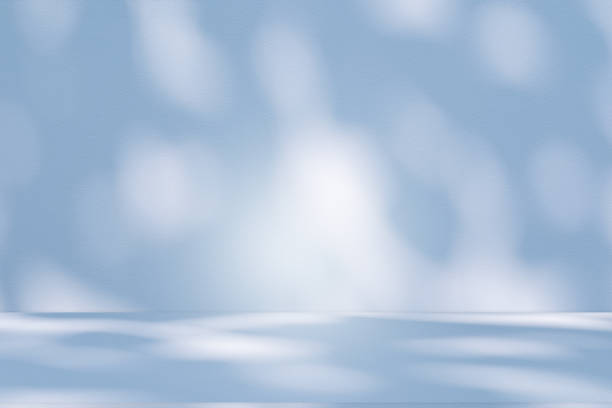 istock Studio style background wall decoration presentation uses white and blue tones. with shadows cast from a nearby window, concept creating a decorative 2200510147