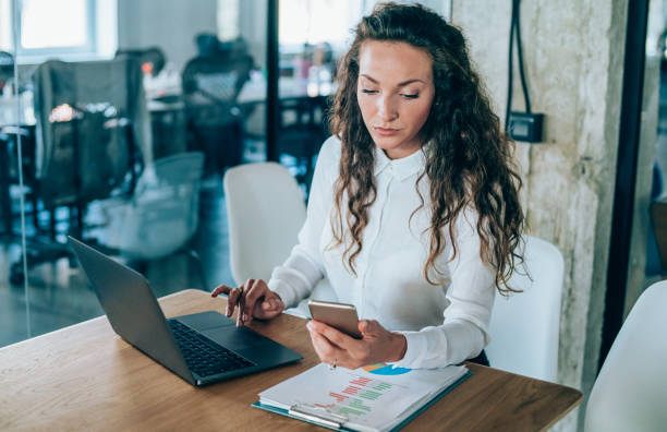 istock Attractive businesswoman in office. 2200515077
