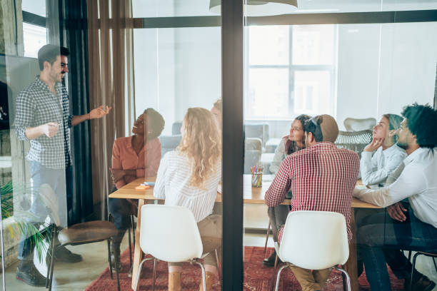 istock Manager presenting his coworkers new business strategy on a meeting. 2200517433