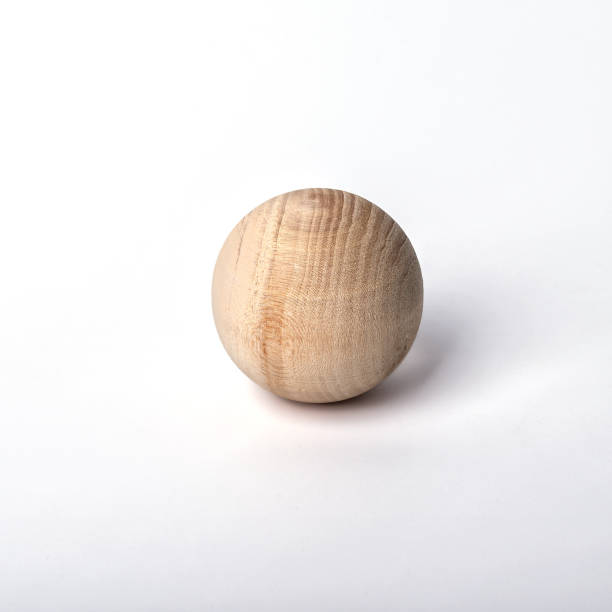 istock Wooden ball on white background. 2200520959