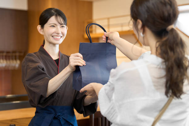 istock A restaurant employee handing out a product 2200521851