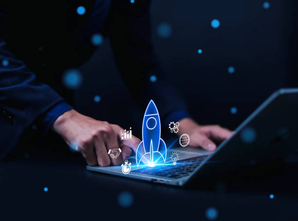istock Businessman touching transparent rocket icon launching. Startup concept, rocket, growth, company, idea, success, digital, technology, marketing, finance, innovation, project, design, creativity. 2200522797