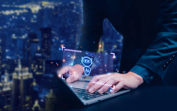 istock Businessman chatting with AI or artificial intelligence technology. A man uses a laptop computer to chat with an intelligent AI. 2200522923