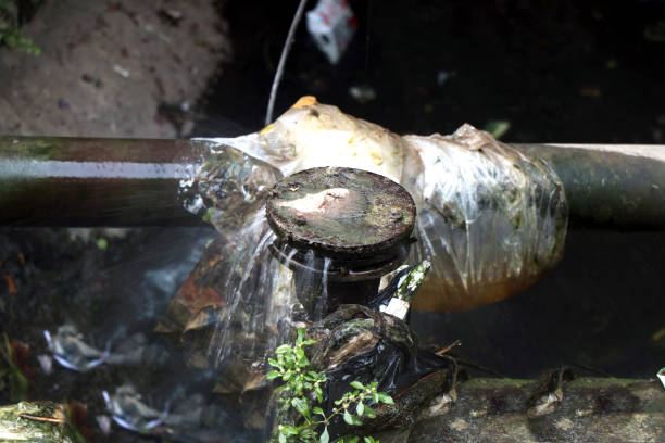 istock water leakage from a water pipe line. 2200526032