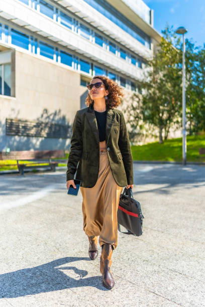 istock Modern arab entrepreneur walking confident along city 2200536570