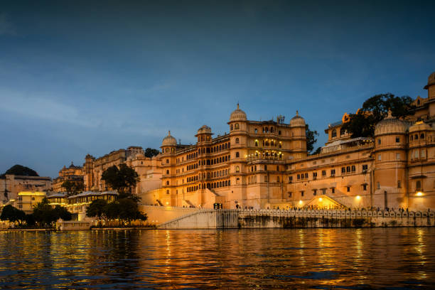 istock illuminated city palace of Udaipur at blue hour 2200539734