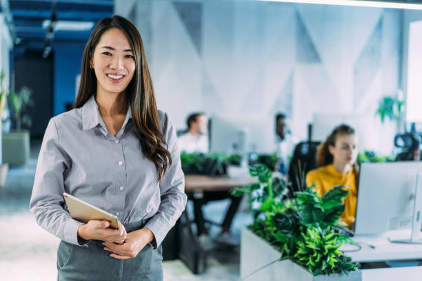 istock Successful businesswoman in the office. 2200542731