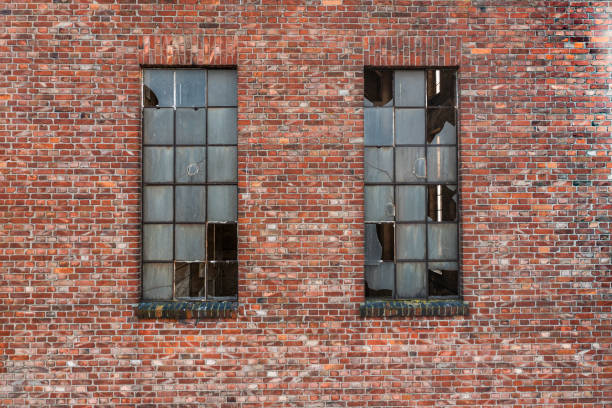 An abandoned building with broken windows
